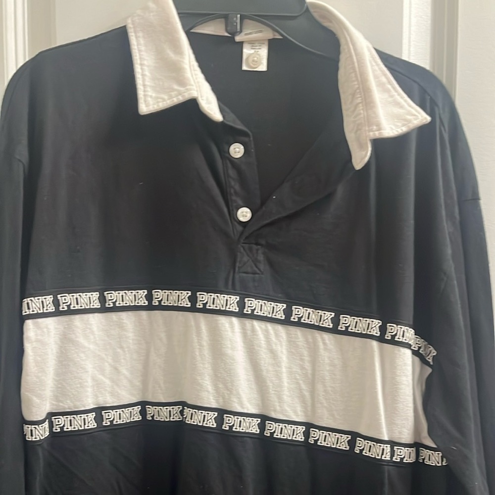 Long sleeve black top with design